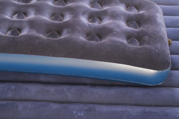 Blue inflatable mattress for sleeping and resting