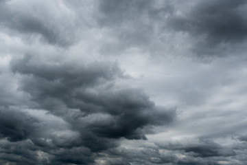 Obraz premium dark storm clouds,clouds with background,Dark clouds before a thunder-storm.