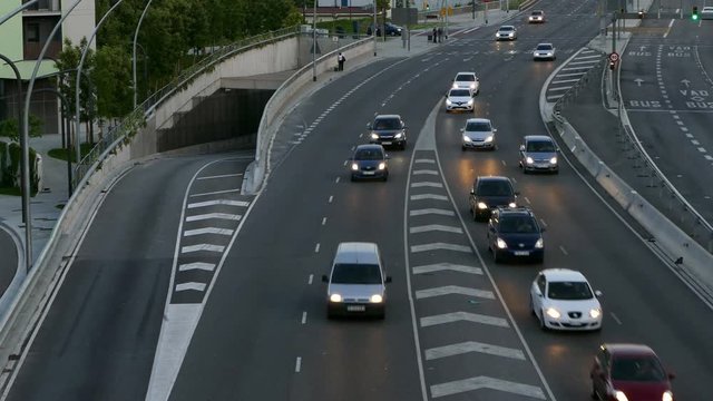 Traffic at dusk in a main street of entry and exit of Barcelona. Top view. Time Lapse