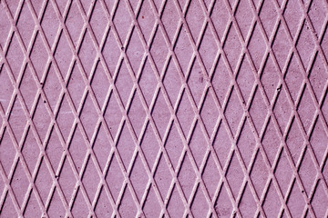 purple cement floor with rhombus pattern.