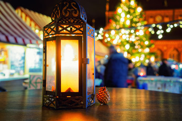 Street lantern in Christmas market in night Riga