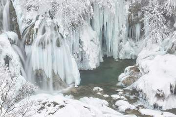 Frozen lakes and waterfalls in Plitvice Lakes National Park, Croatia, Europe