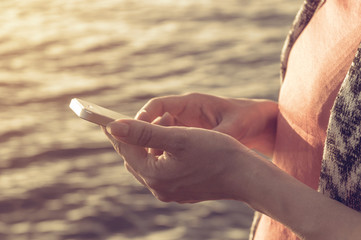 Girl's hand with phone