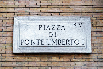 Piazza di Ponte Umberto street sign on wall in Rome