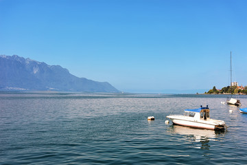 Fototapeta na wymiar Boat on Geneva Lake of Montreux Swiss Riviera