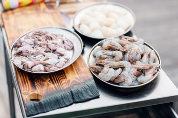 Fresh raw seafood. On metal table