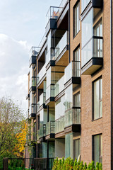 Fototapeta na wymiar Glass architecture of modern apartment residential building