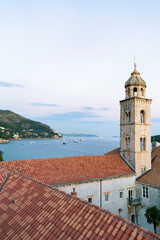 Fototapeta premium Dominican monastery belfry and Adriatic Sea Dubrovnik evening Croatia
