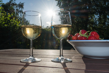 Backlit glasses with sparkling wine