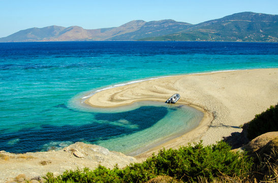 beautiful sea lagoon with boat on beach