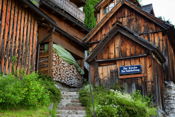 Fototapeta na wymiar Typical Austrian Alpine house with bright flowers, Hallstatt, Austria, Europe