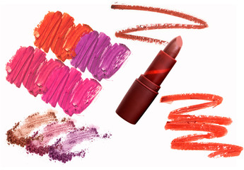 Collection of smudged lipsticks isolated on white
