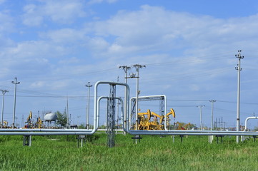 Fototapeta na wymiar The pipe and valve oil fields