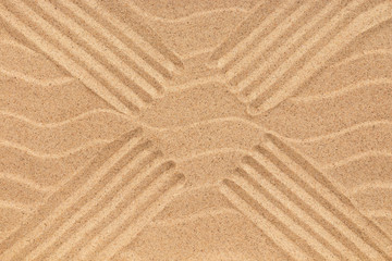 Texture of sand with four lines.