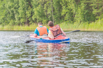 Fototapeta na wymiar kayaking friends in the water hike.