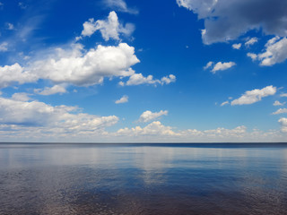 Naklejka na ściany i meble Tranquille scene of sky reflection on the sea