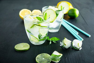 Refreshing summer drink with crushed ice and citrus fruits