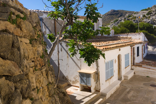 Elevated view of an old house in Cala San Vincente on the Spanish island Mallorca