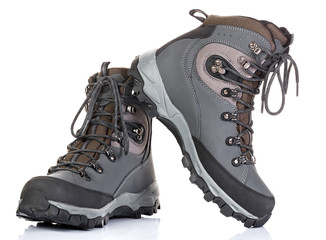 Tourist boots for mountain hikes with reinforced soles and membrane material.