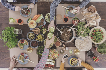 Four people having dinner together