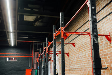 horizontal bar in Loft big empty interior of the gym for fitness workout.