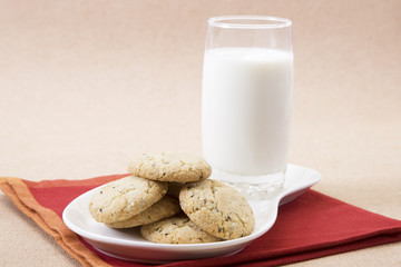 Sesame Seeds Biscuits, Dry Fruit and Glass of Milk