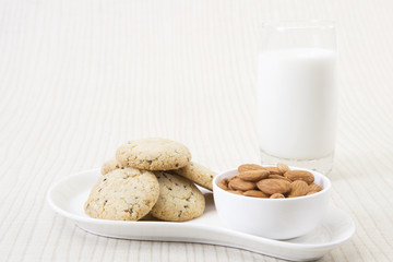 Sesame Seeds Biscuits, Dry Fruit and Glass of Milk