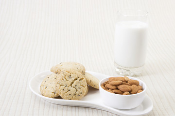 Sesame Seeds Biscuits, Dry Fruit and Glass of Milk