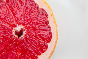 Fruit pink grapefruit in the cut. A vitamin product. Healthy eating.