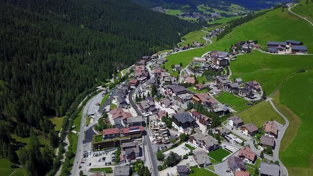 Drone aerial view on the village of San Cassiano, Alta Badia, Sud Tirol, Italy
