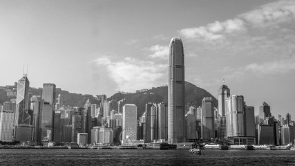 HONG KONG, HONG KONG - DECEMBER 10: Black and white sea front view with luxurious buildings in Hong Kong on  December 10, 2016