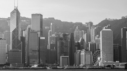 HONG KONG, HONG KONG - DECEMBER 10: Black and white tone sea front view with luxurious buildings in Hong Kong on  December 10, 2016