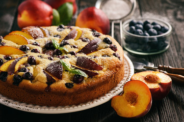 Homemade cake with nectarines and blueberries.