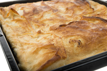 Fresh homemade Turkish borek in tray. 