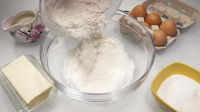 Flour falling to make cake super slow motion