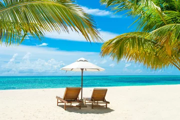 Peel and stick wallpaper Tropical beach Beautiful sandy beach with sunbeds and umbrellas in Indian ocean, Maldives island