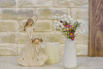 wooden statuette of mother and daughter