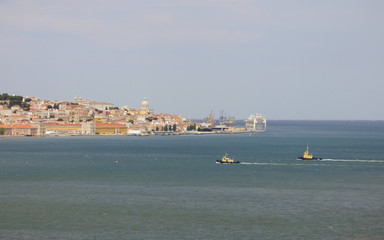 Fototapeta na wymiar Lisbon's cityscape and the river Tagus viewed from Cacilhas, Almada