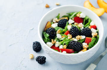 Arugula peach blackberry goat cheese salad