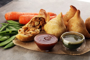 Indian special traditional street food punjabi samosa or Coxinha, Croquete and other Fried Brazilian Snacks