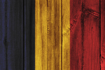 Chad flag painted on wooden wall for background