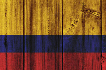 Colombia flag painted on wooden wall for background