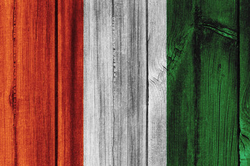 Cote d'Ivoire flag painted on wooden wall for background