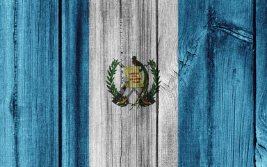 Guatemala flag painted on wooden wall for background