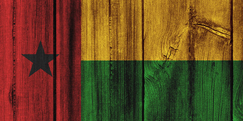 Guinea-Bissau flag painted on wooden wall for background