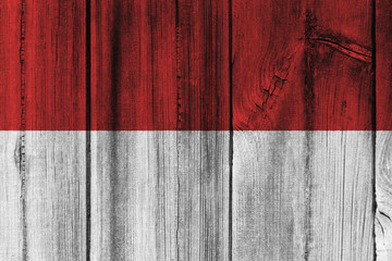 Indonesia flag painted on wooden wall for background