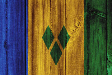 Saint Vincent and the Grenadines flag painted on wooden wall for background