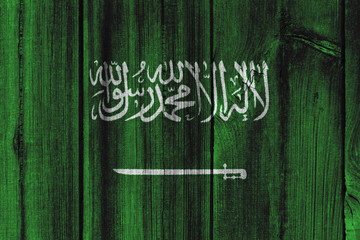 Saudi Arabia flag painted on wooden wall for background