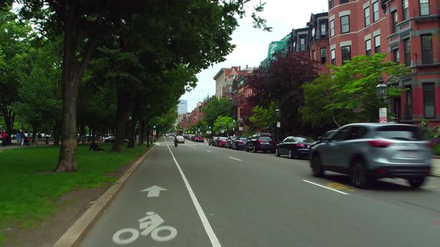 Riding in a bike lane in Boston