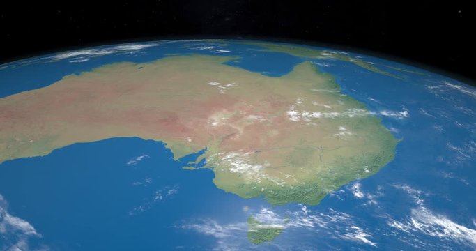 Animation of Australia continent in planet earth from outer space gyrating in time lapse with the universe at background